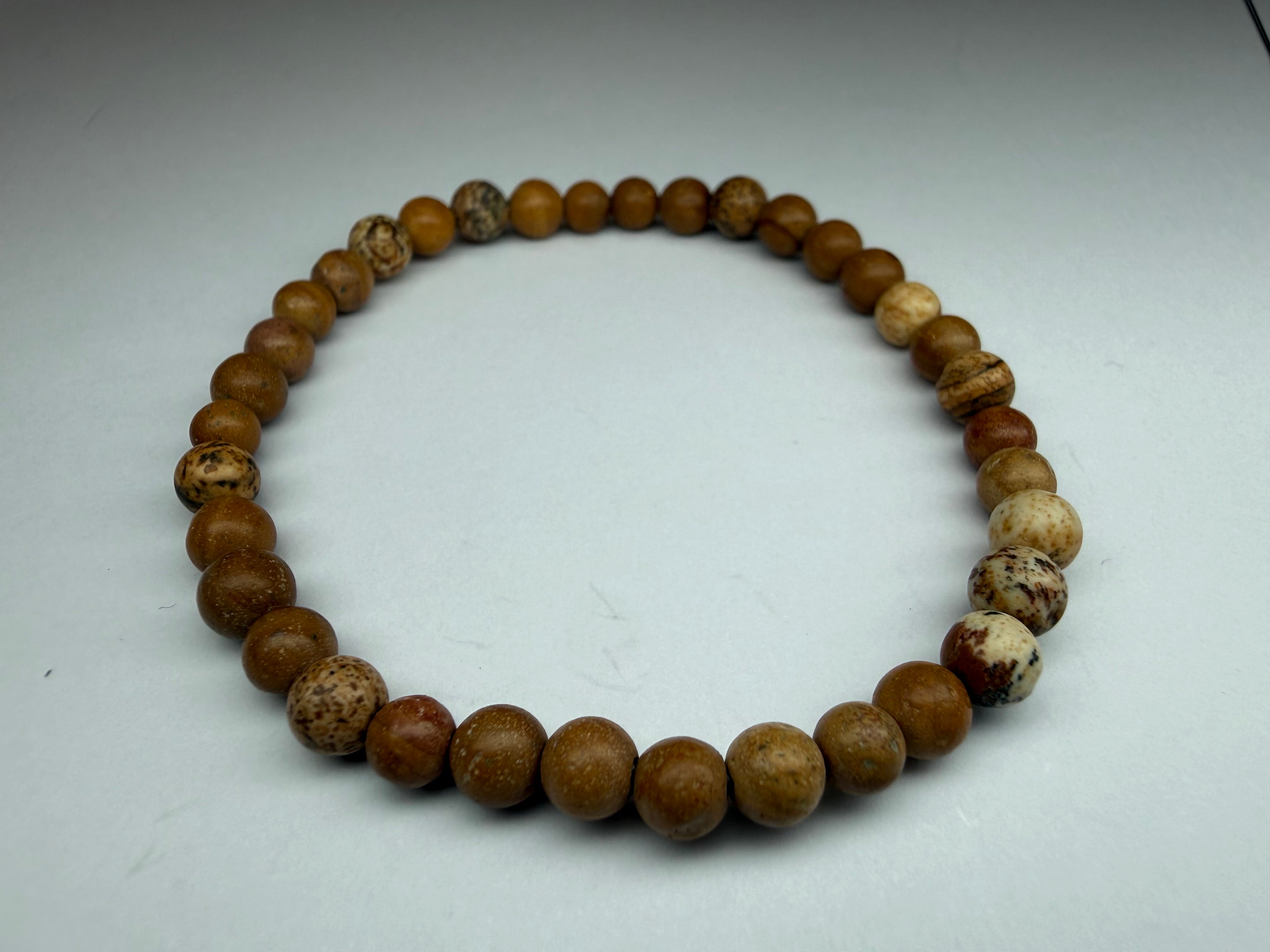 Wooden beaded bracelet on a white background