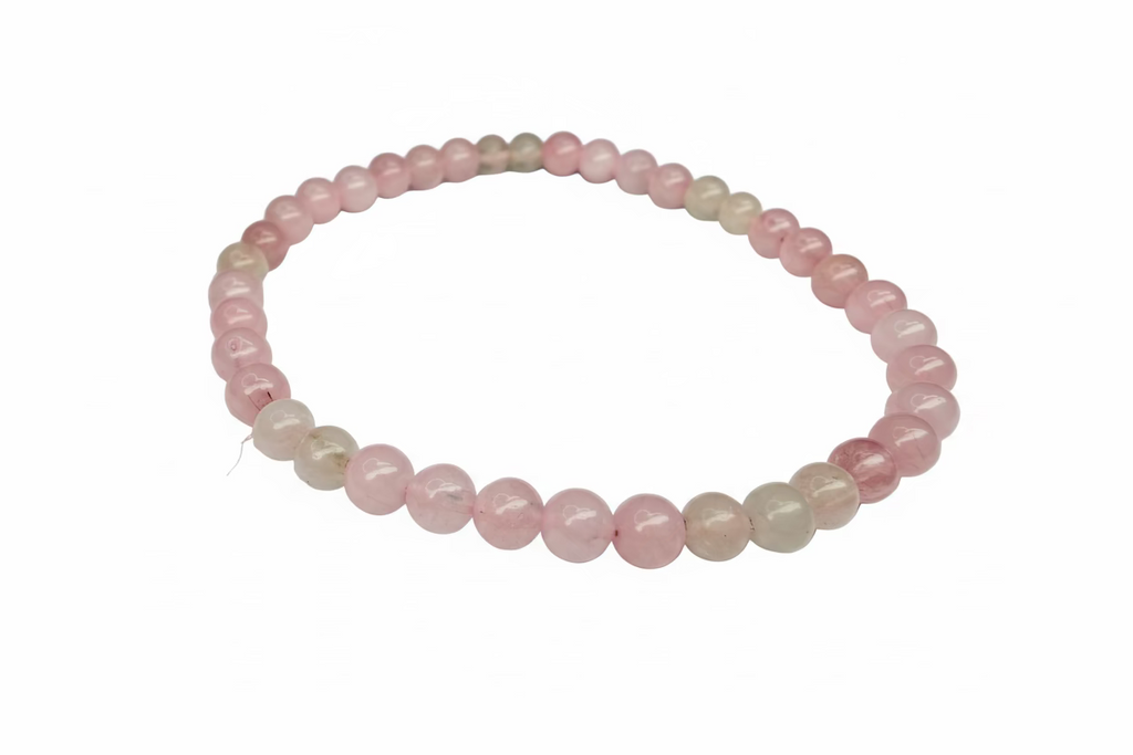 Pink beaded bracelet on a white background