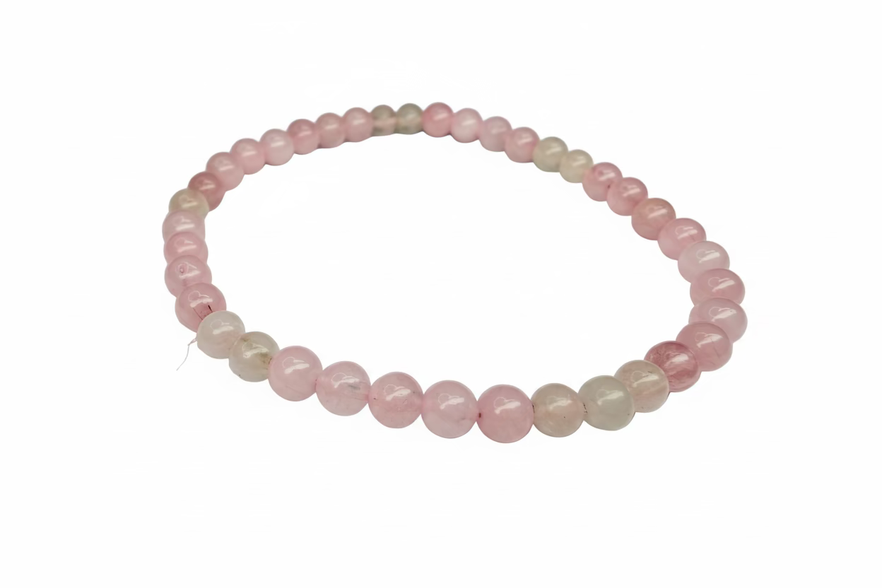Pink beaded bracelet on a white background