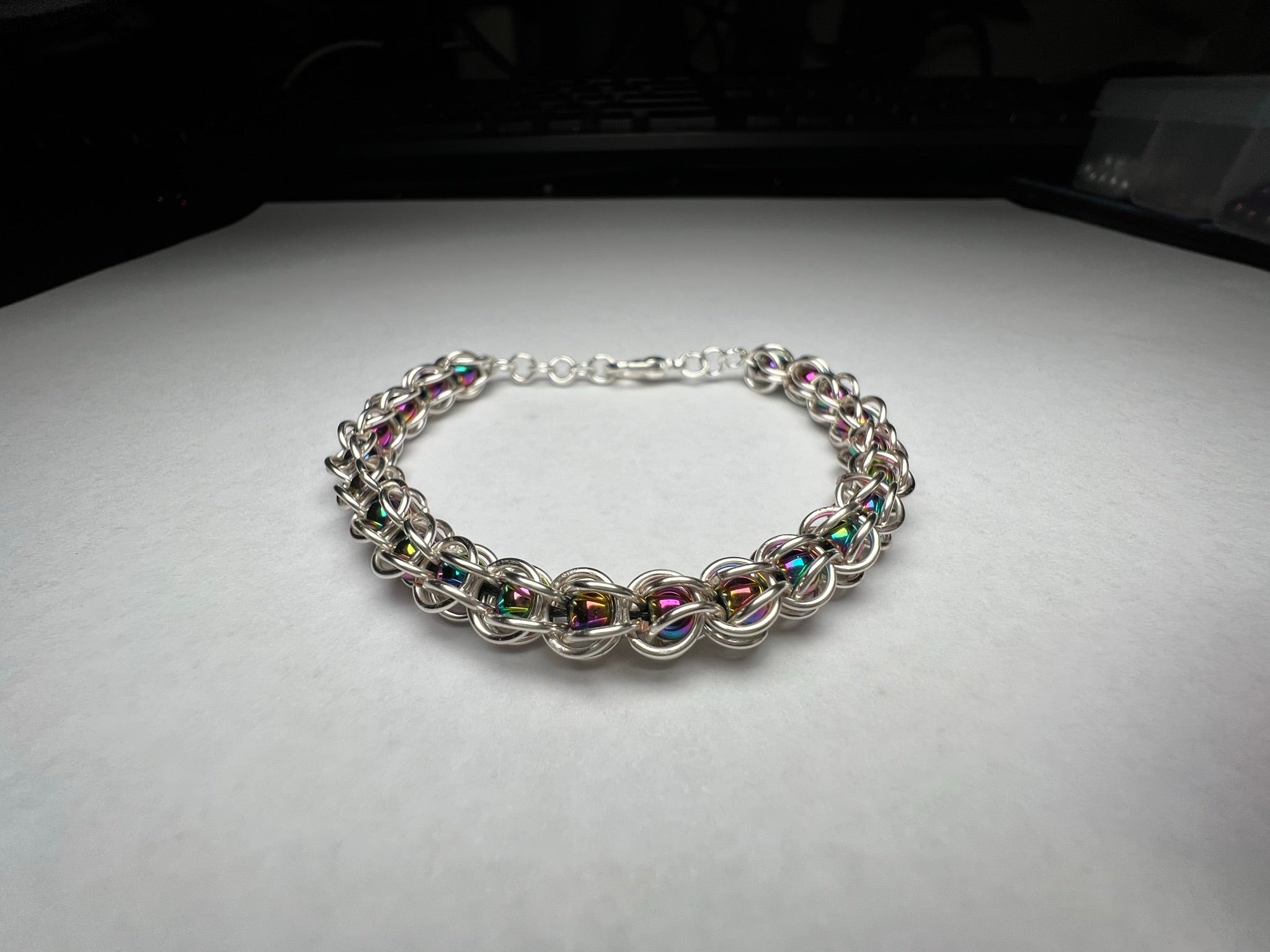 Rainbow Hematite 4mm Beads Captured Bead Bracelet