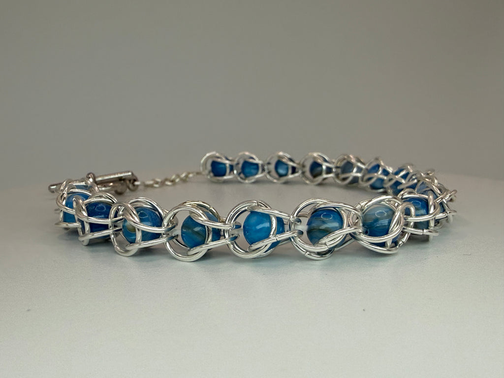 Captured Bead Bracelet with Blue Shell Iridescent Beads