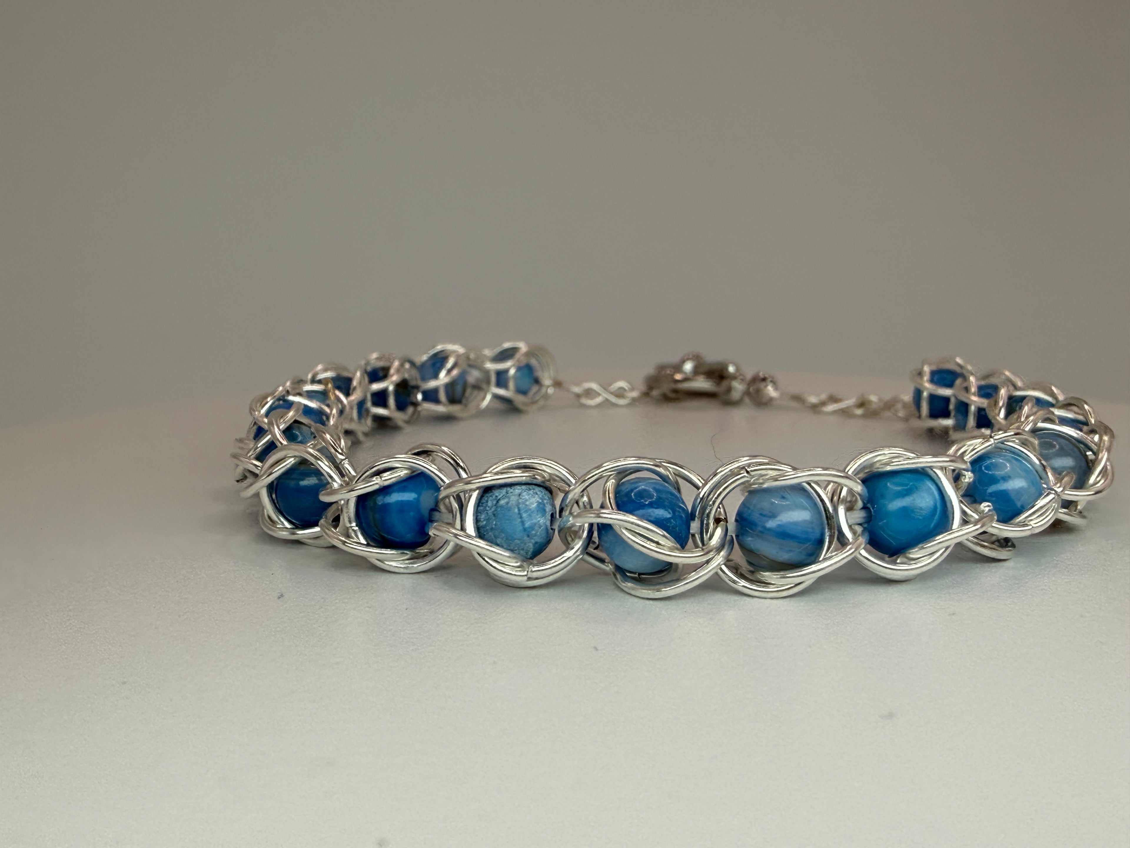 Captured Bead Bracelet with Blue Shell Iridescent Beads