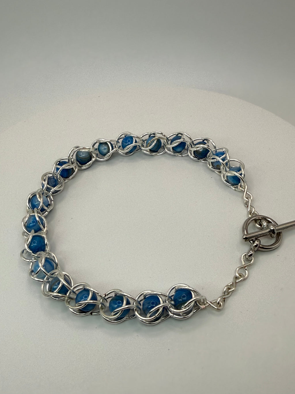 Captured Bead Bracelet with Blue Shell Iridescent Beads