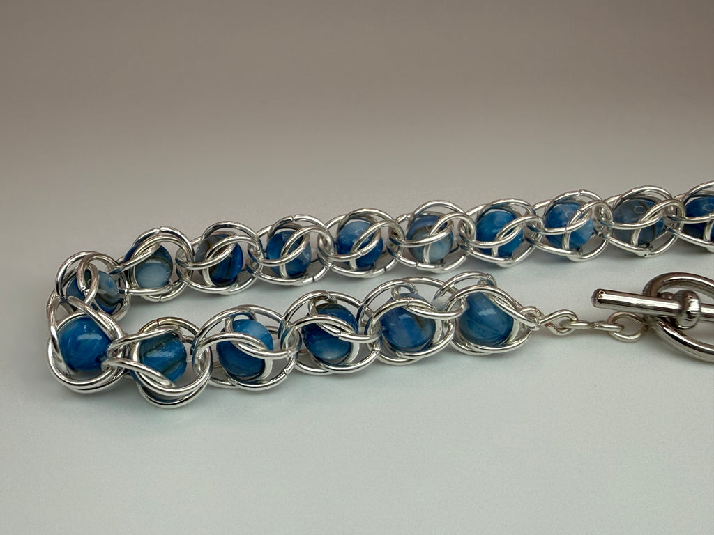 Captured Bead Bracelet with Blue Shell Iridescent Beads