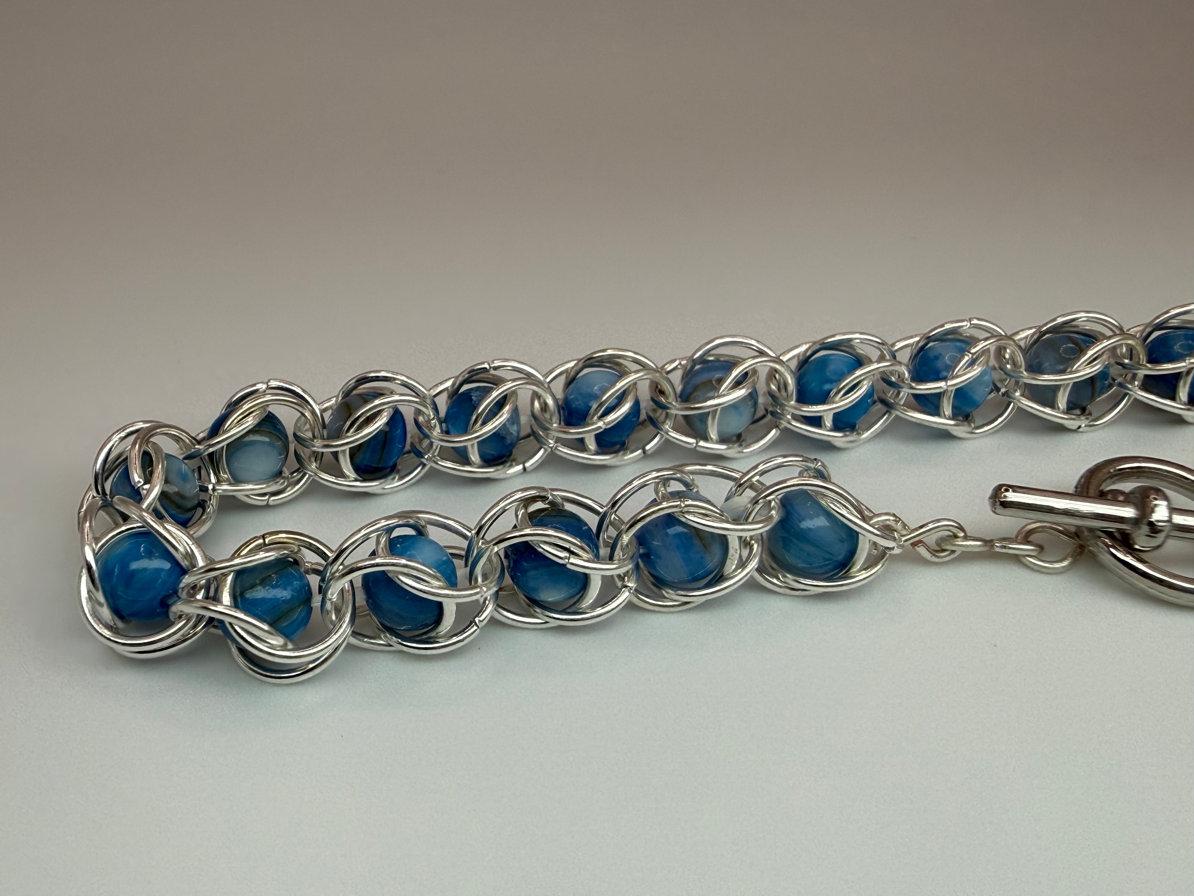Captured Bead Bracelet with Blue Shell Iridescent Beads