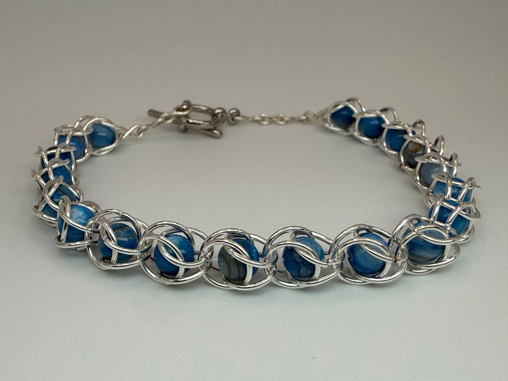 Captured Bead Bracelet with Blue Shell Iridescent Beads