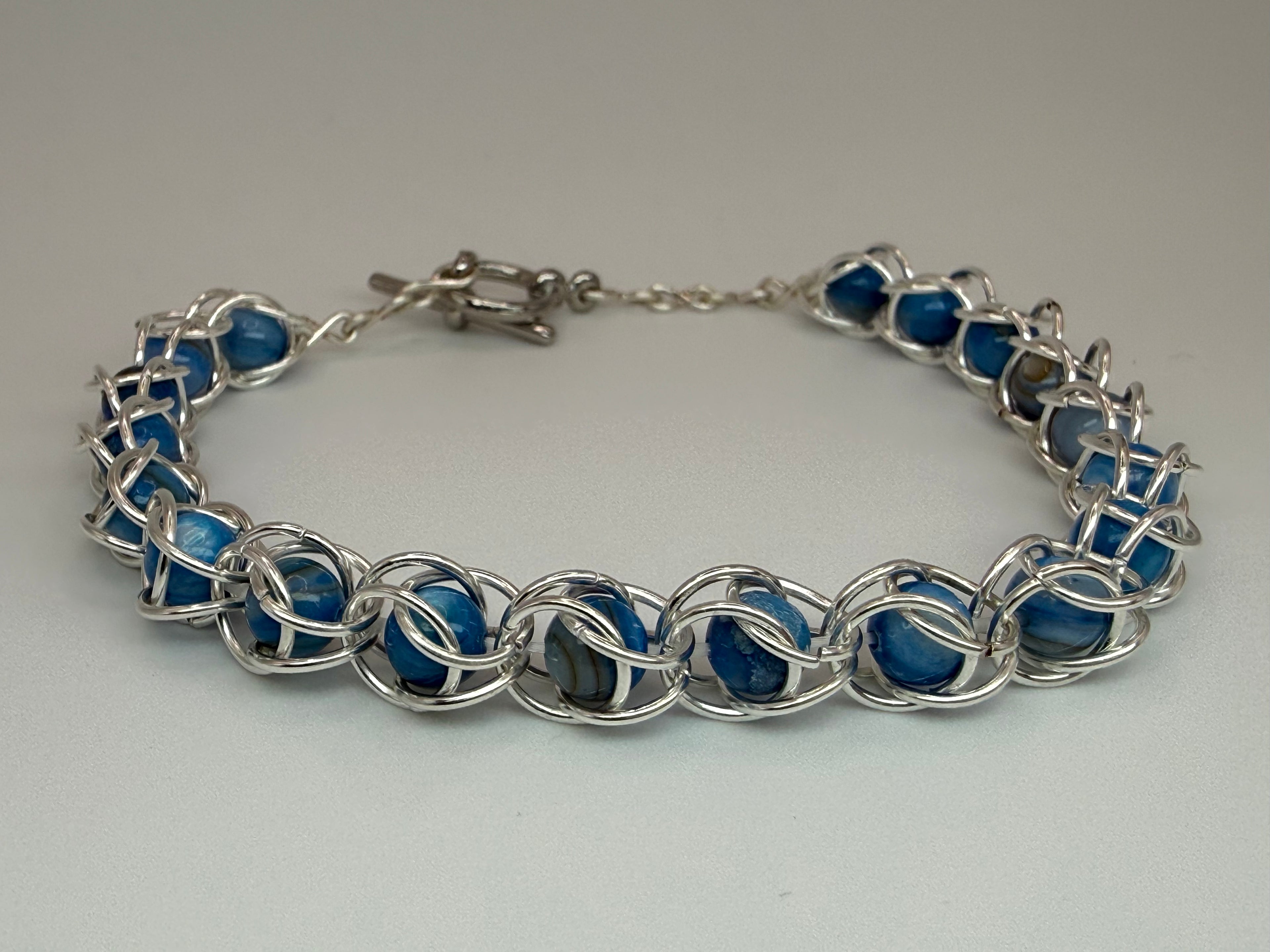Captured Bead Bracelet with Blue Shell Iridescent Beads
