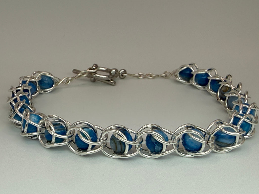 Captured Bead Bracelet with Blue Shell Iridescent Beads