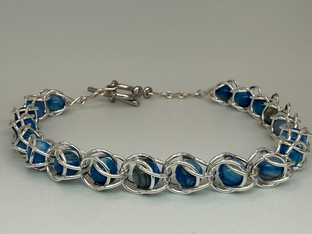 Captured Bead Bracelet with Blue Shell Iridescent Beads