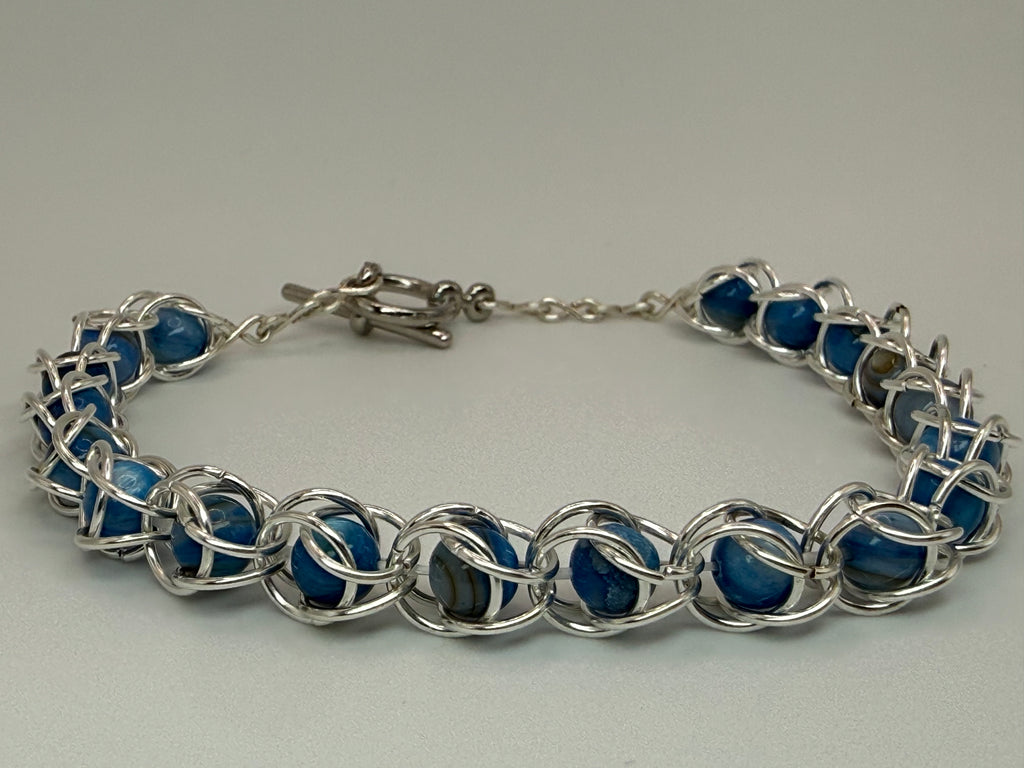 Captured Bead Bracelet with Blue Shell Iridescent Beads