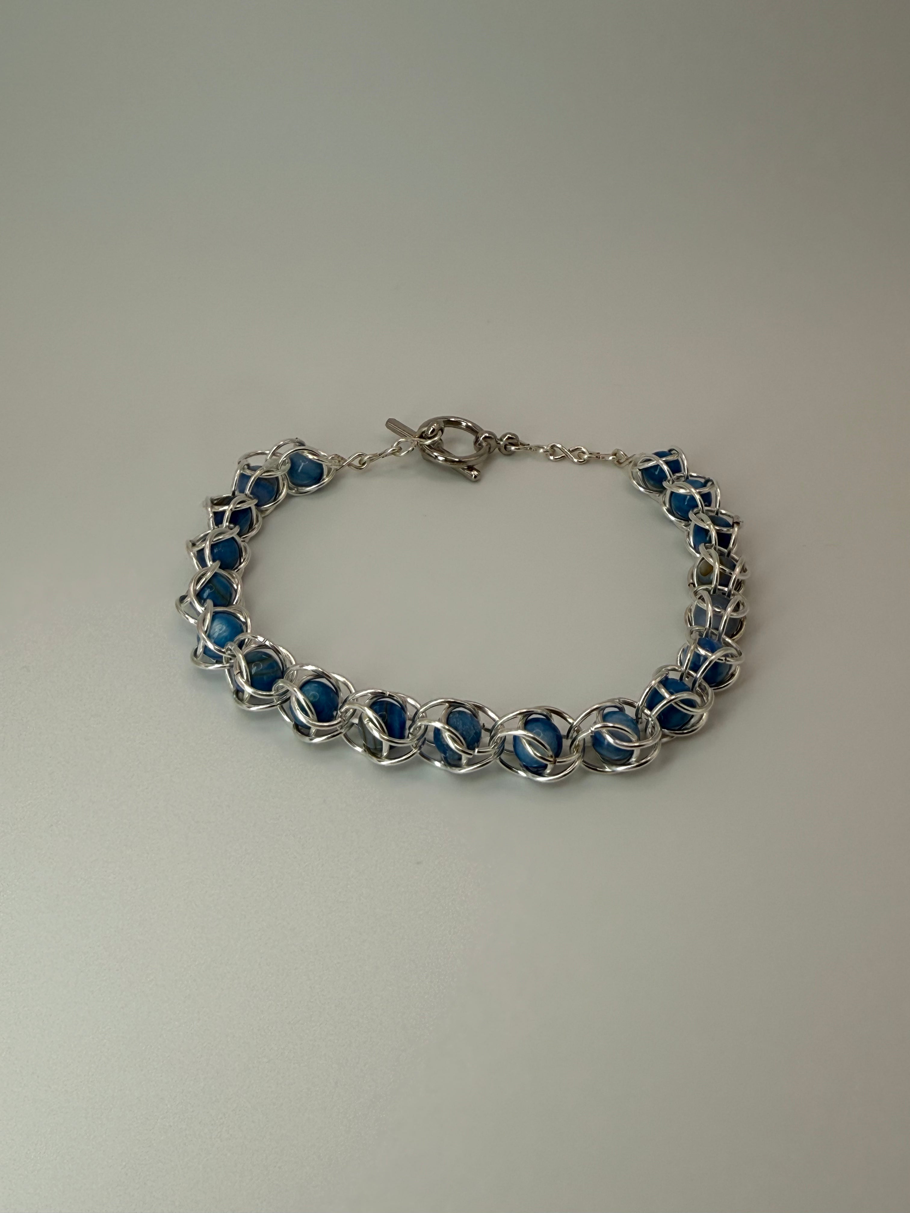Captured Bead Bracelet with Blue Shell Iridescent Beads