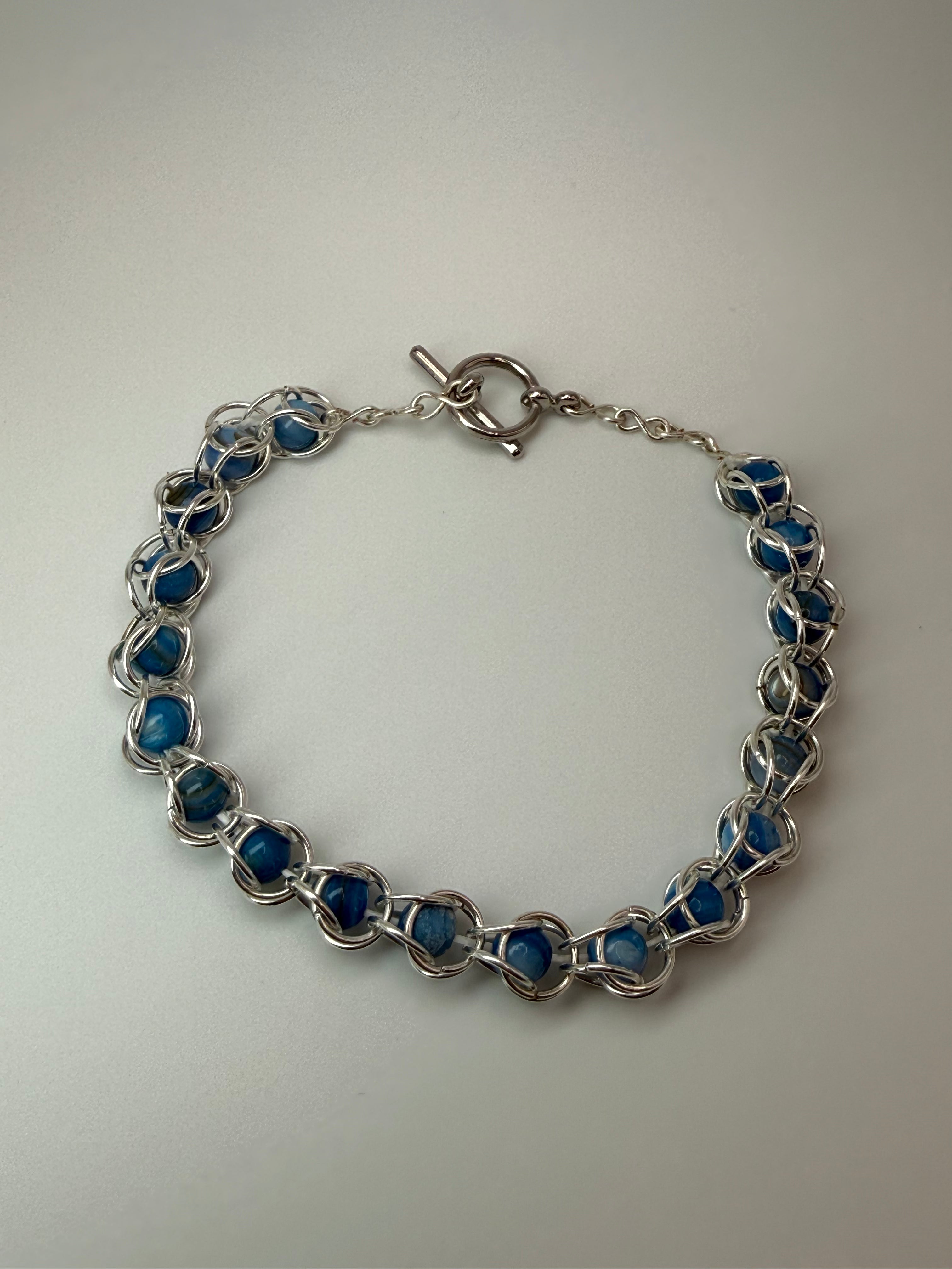 Captured Bead Bracelet with Blue Shell Iridescent Beads