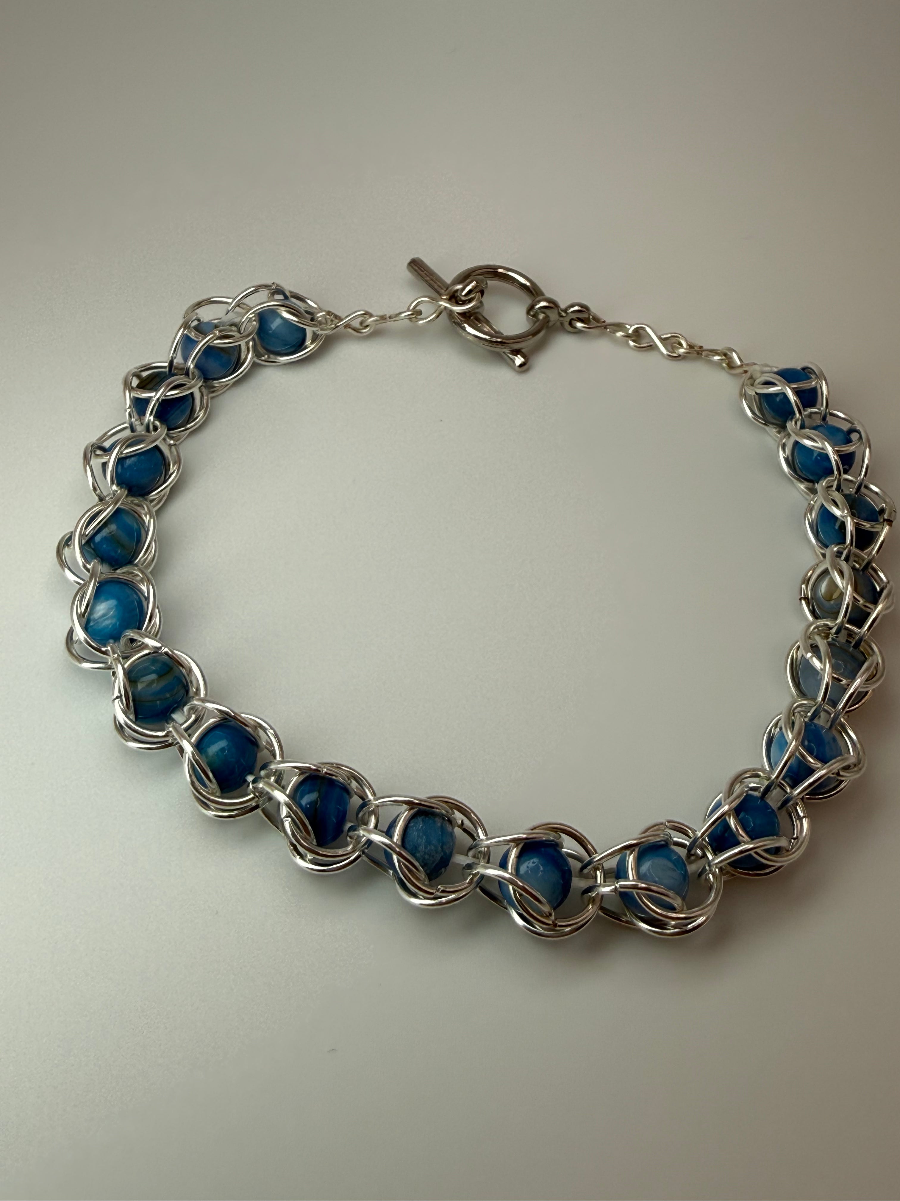 Captured Bead Bracelet with Blue Shell Iridescent Beads